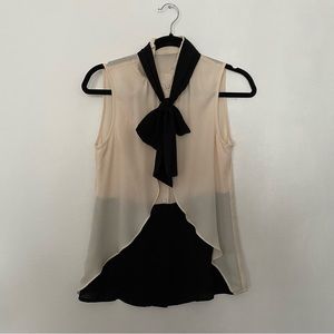 Flowy sleeveless blouse with neck sash size XS